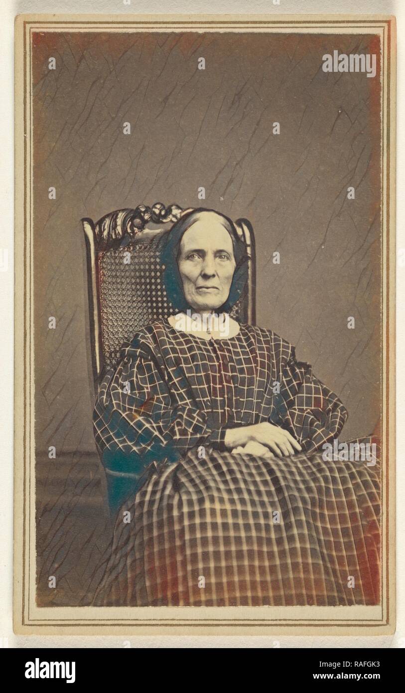 woman wearing a checkered dress, seated in a wicker chair, Abraham F. Burnham (American, active 1880s - 1890s), 1866 reimagined Stock Photo