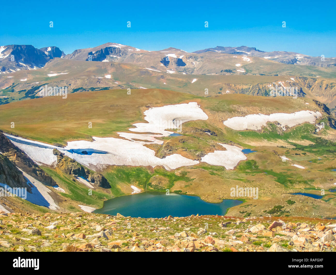Aerial Alpine lake along Beartooth Highway, Northeast gateway of Yellowstone National Park. Beartooth Highway, the most beautiful drive in America, is a section of Route 212 in Montana and Wyoming. Stock Photo
