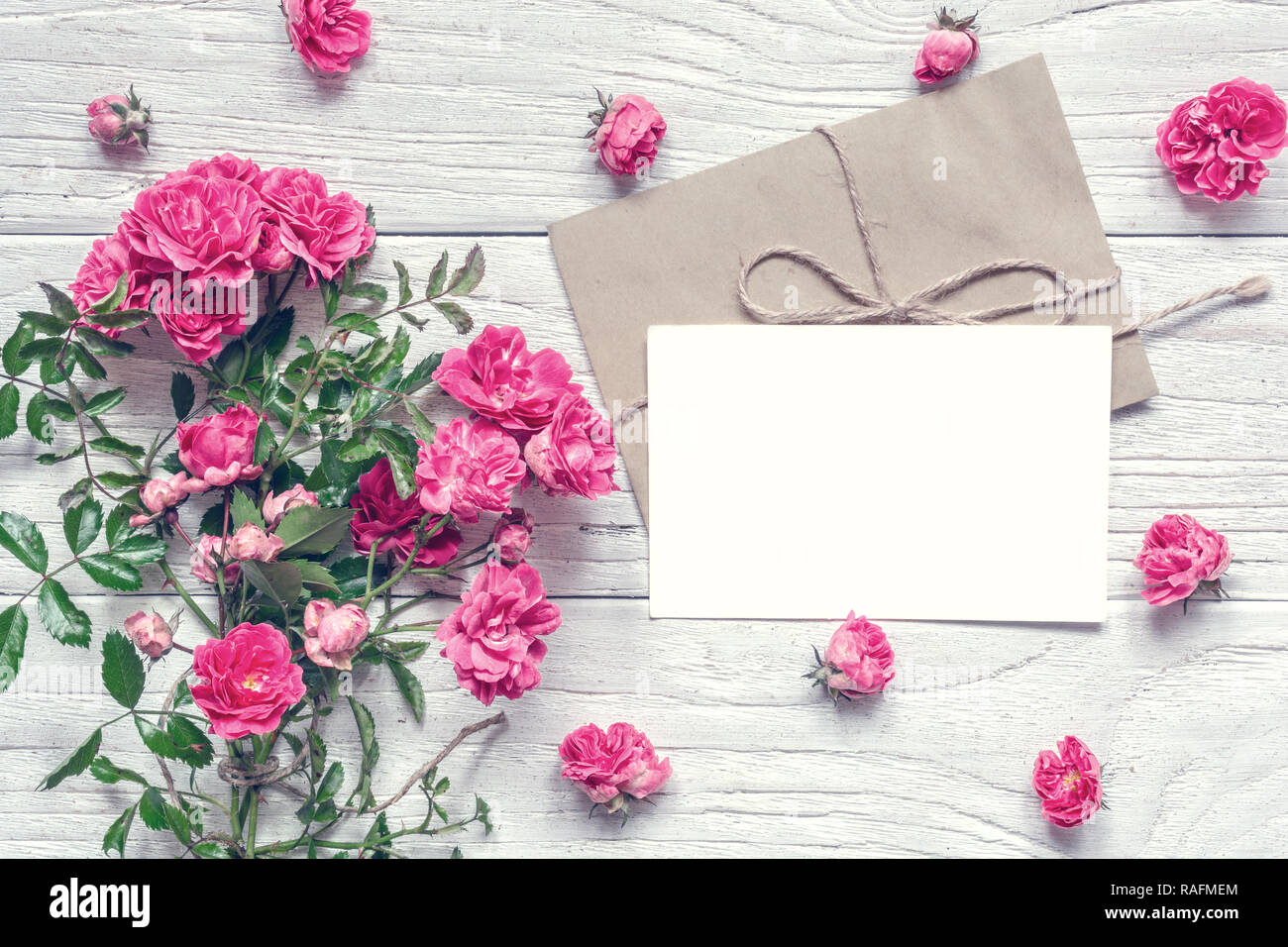 blank white greeting card and envelope with pink rose flowers bouquet ...