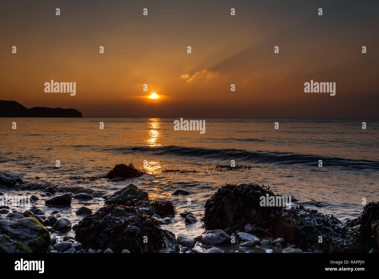 Streak of sunlight across the sea Stock Photo Alamy