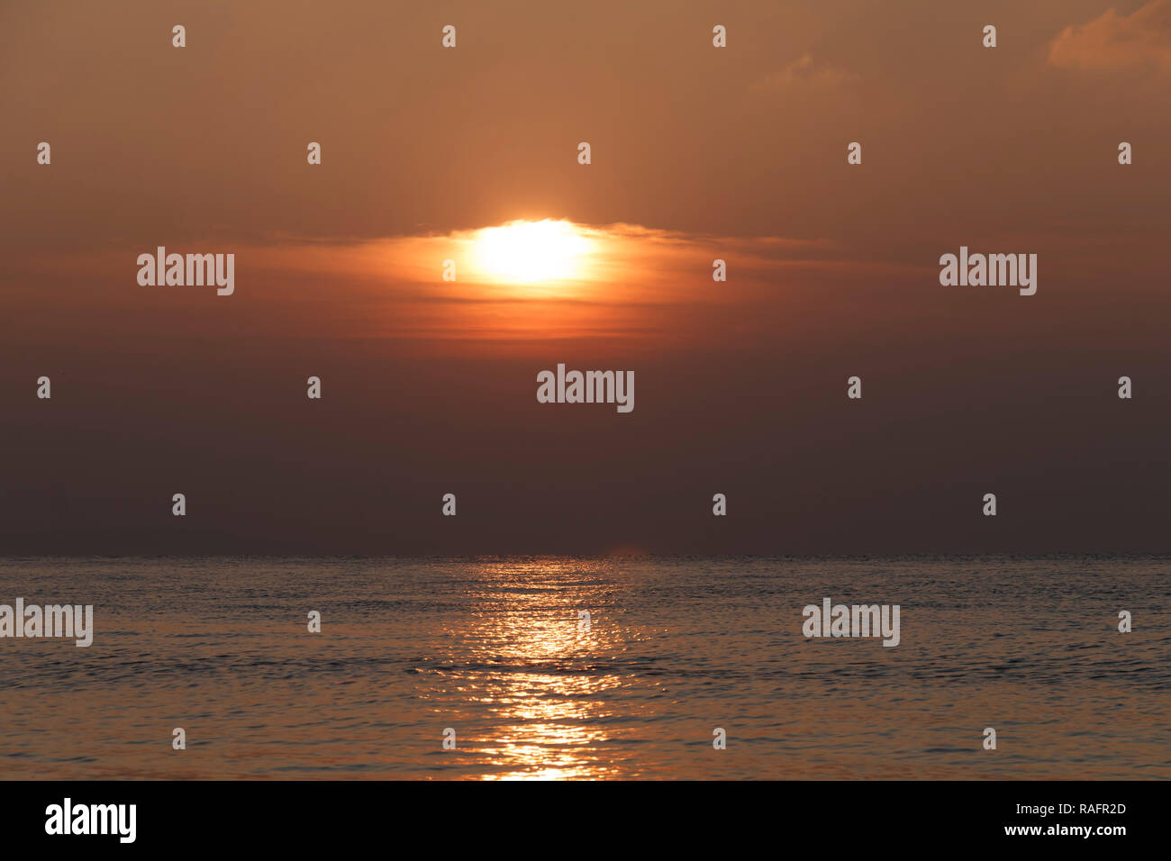 Streak of sunlight across the sea Stock Photo Alamy