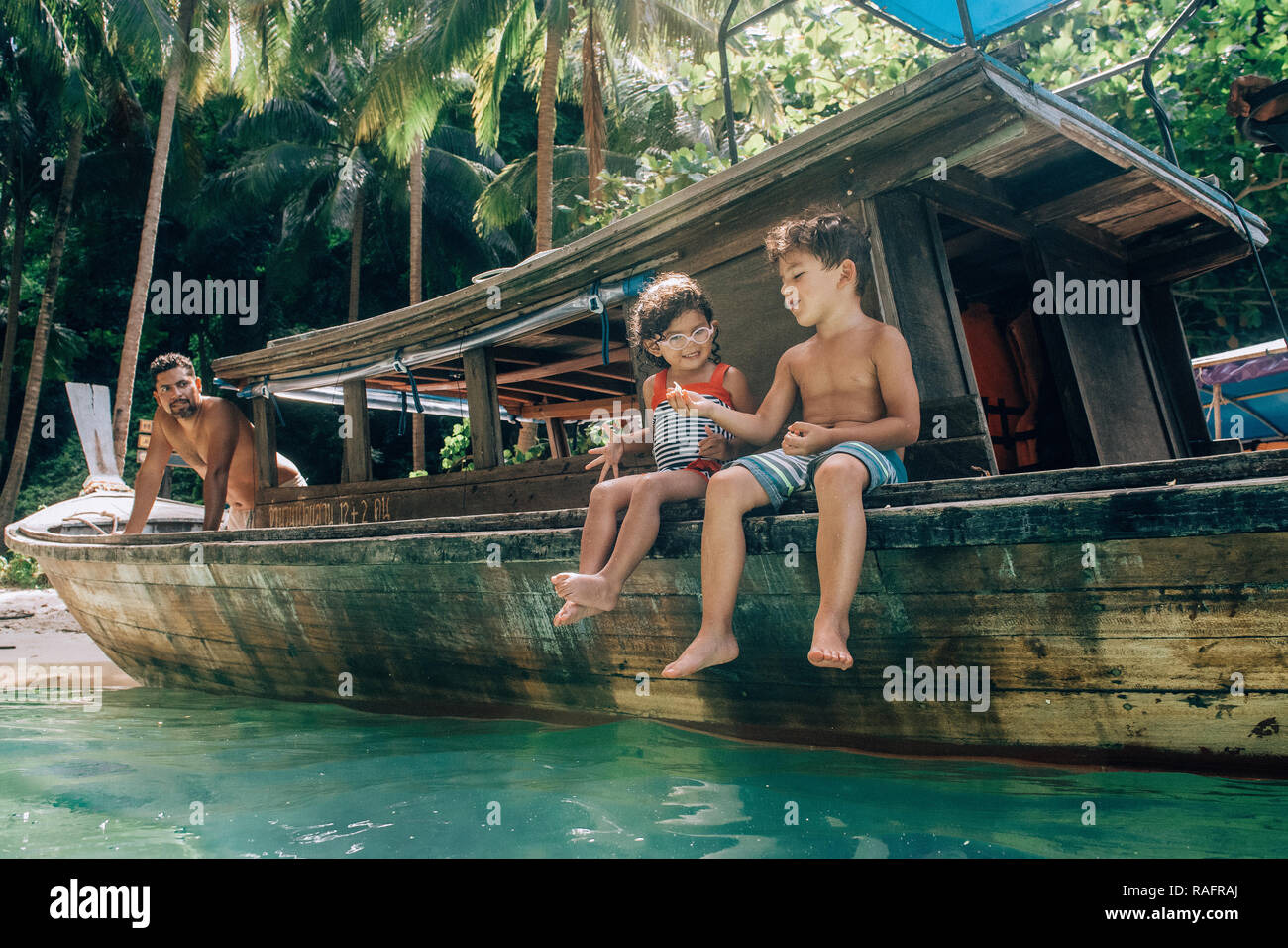 Santiago and Nora pictured in Koh Yao Noi, Thailand (2). MEET the unconventional family who sold ALL their possessions and rented out their house rais Stock Photo