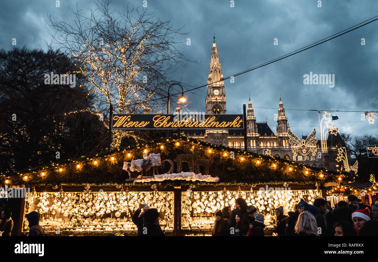 Night shot of Christmas markets at Rathausplatz, the text Wiener  Christkindlmarkt, town hall in the background Stock Photo - Alamy