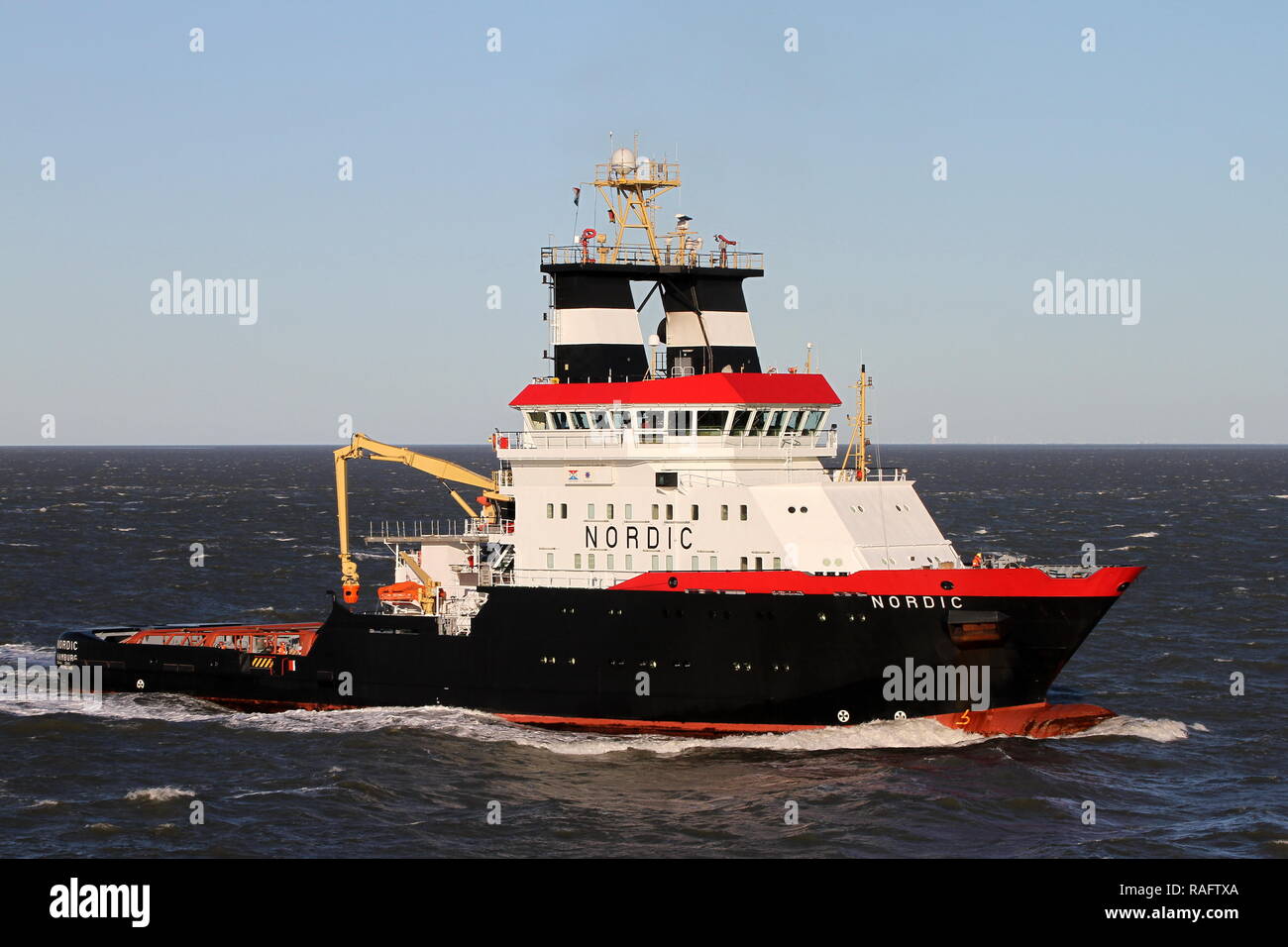 The emergency tug Nordic returns on 2 January 2019 from an emergency operation on the North Sea to Cuxhaven. Stock Photo