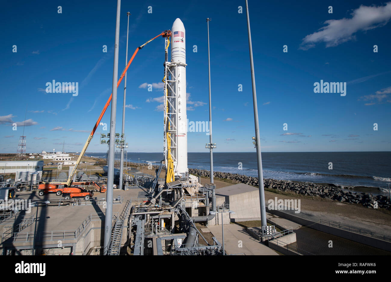 The Northrop Grumman Antares rocket, with Cygnus resupply spacecraft onboard, is prepared for launch on Pad-0A at the NASA Wallops Flight Facility November 16, 2018  in Wallops, Virginia. The commercial cargo resupply mission will carrying 7,400 pounds of supplies and equipment to the International Space Station. Stock Photo