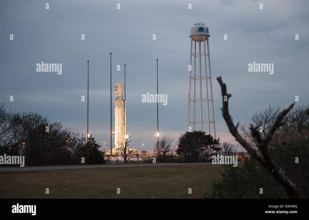 The Northrop Grumman Antares rocket, with Cygnus resupply spacecraft onboard, is prepared for launch on Pad-0A at the NASA Wallops Flight Facility November 14, 2018  in Wallops, Virginia. The commercial cargo resupply mission will carrying 7,400 pounds of supplies and equipment to the International Space Station. Stock Photo