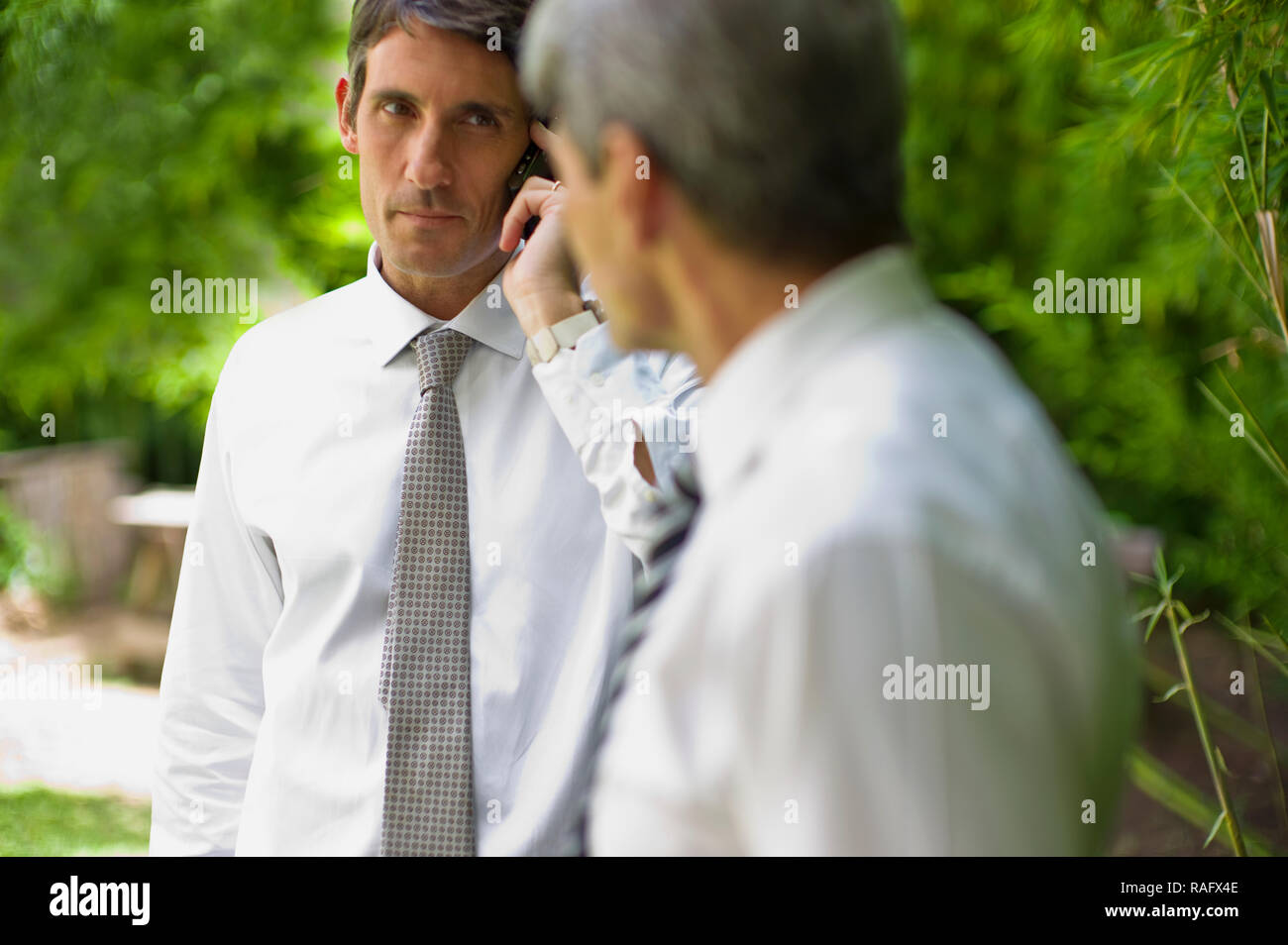 Businessman talking on his cell phone. Stock Photo