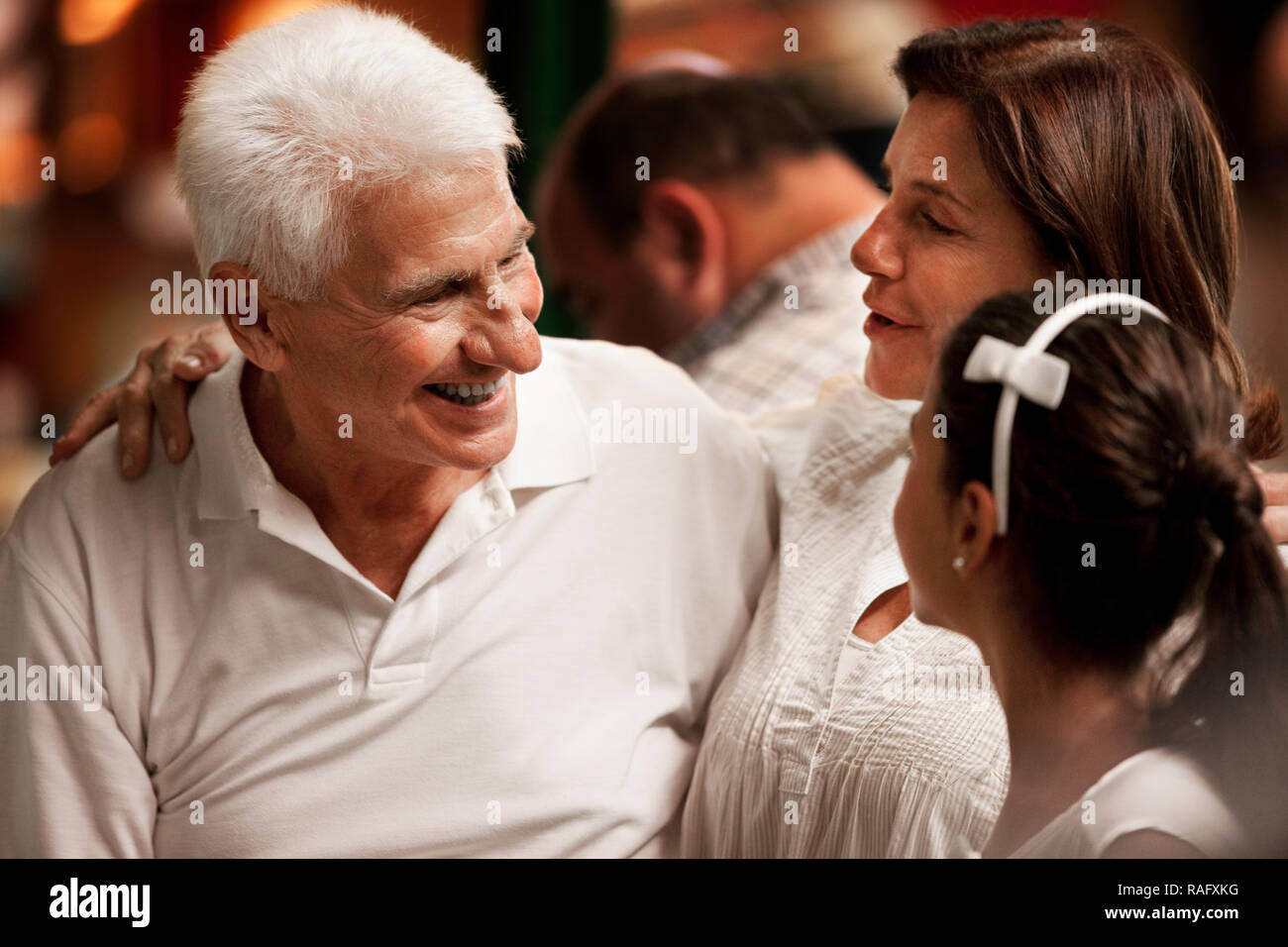 Close-up of a happy family looking at one another. Stock Photo