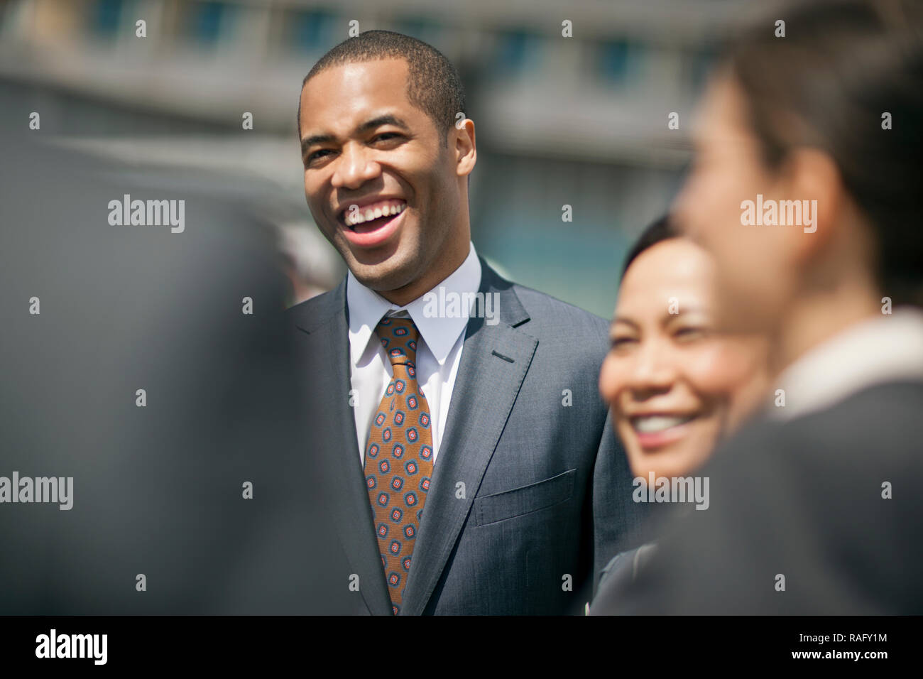 Young businesspeople laughing together. Stock Photo