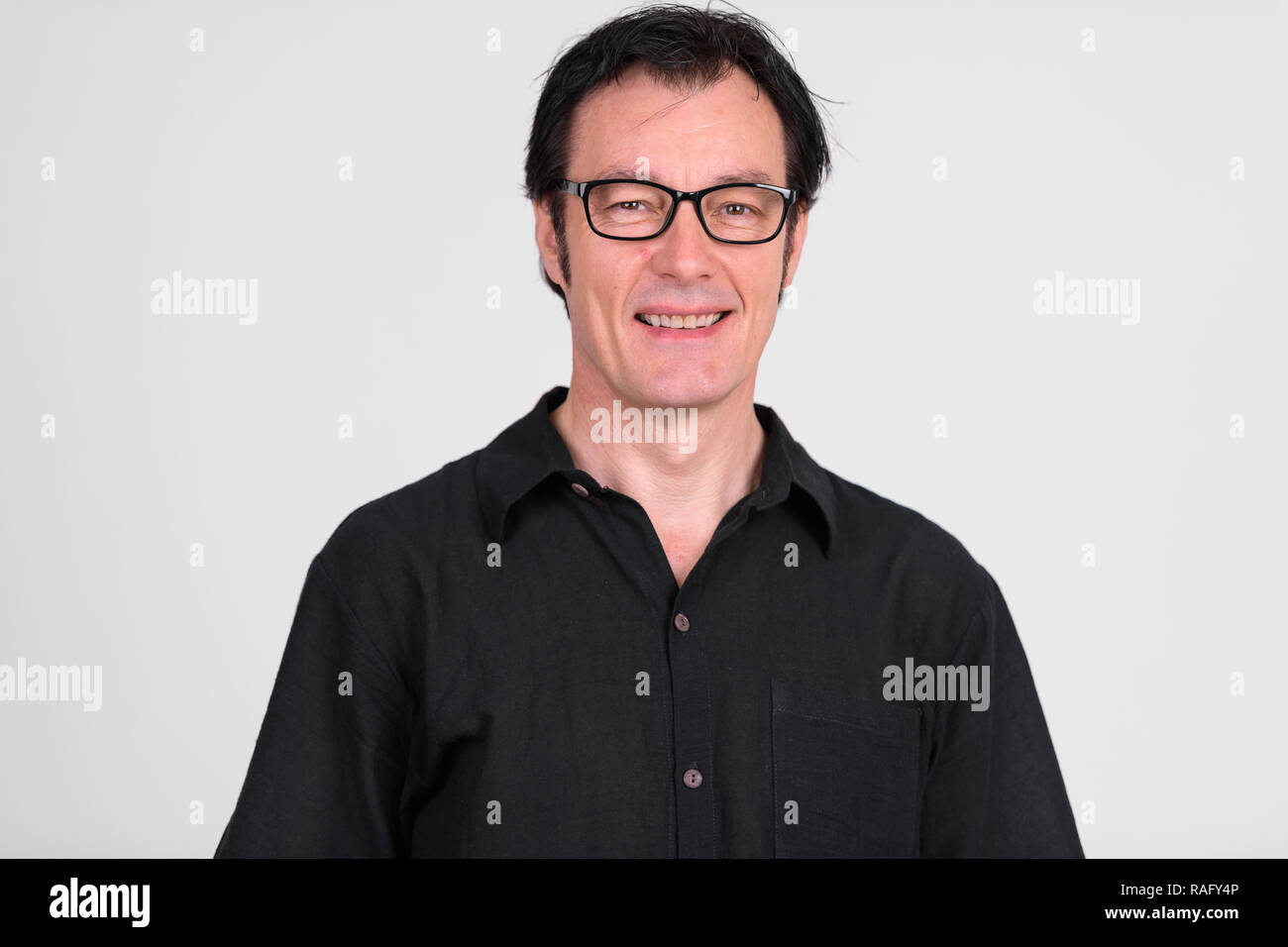 Face of happy mature handsome man with eyeglasses smiling Stock Photo ...