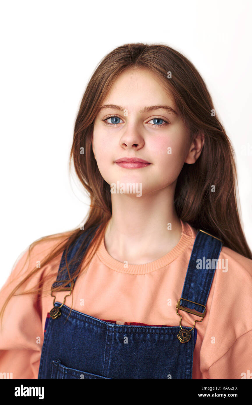 blue eyed brown haired shy girl with flowing hair Stock Photo - Alamy
