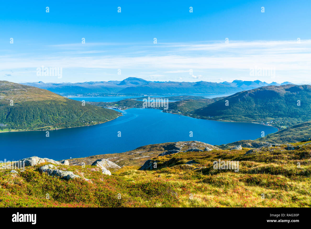 View of fjord Kakdfjorden on the west coast of the island of Kvaloya in Tromso Municipality in Troms county, Norway Stock Photo