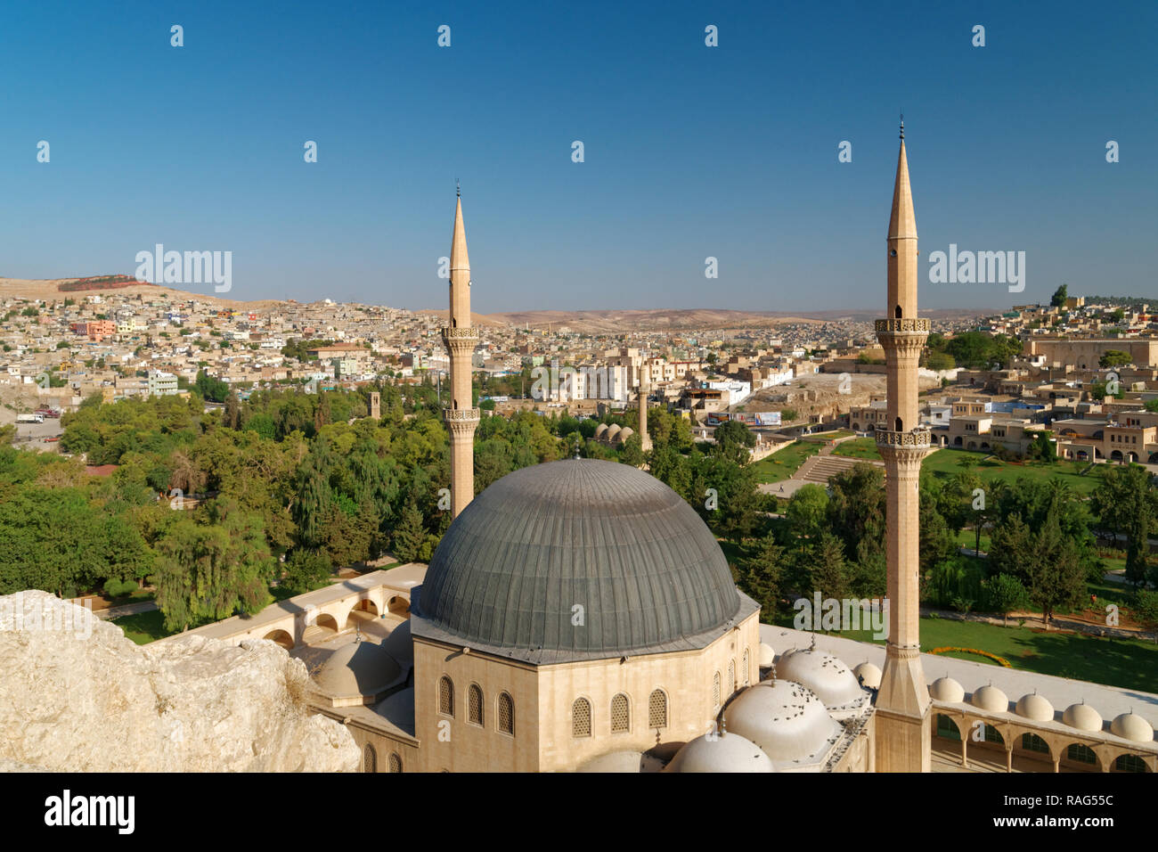 Urfa, Turkey - August 19, 2008: Yeni Dergah Mosque against the cityscape of Sanli Urfa. This mosque have been constructed in 1986 beside the Mevlid-i  Stock Photo