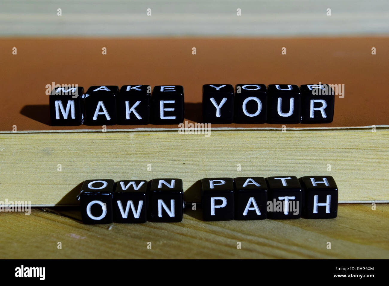Make your own path on wooden blocks. Motivation and inspiration concept ...