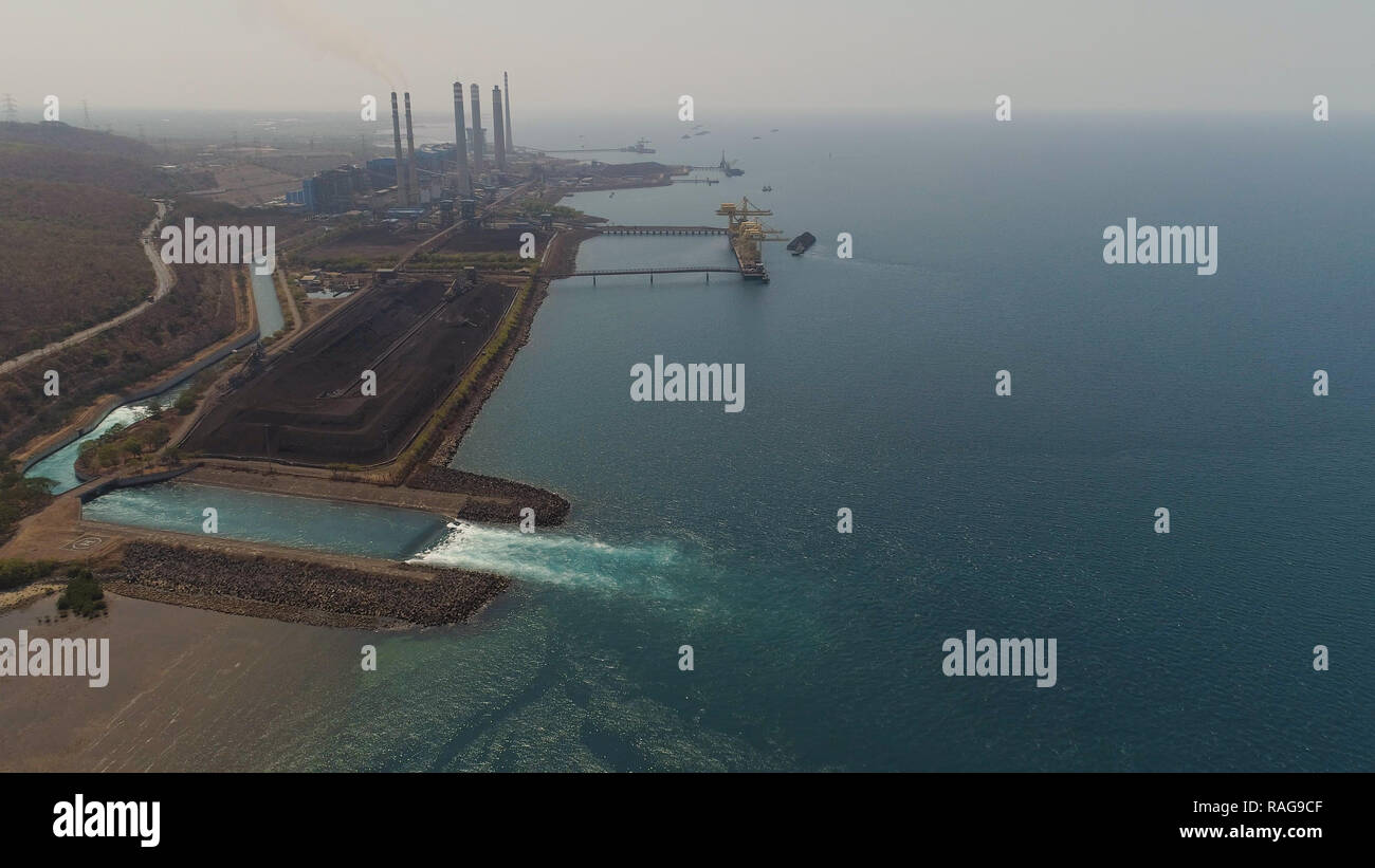 Java Power Plant power station with spillway by sea with smoking pipes, paiton java ...