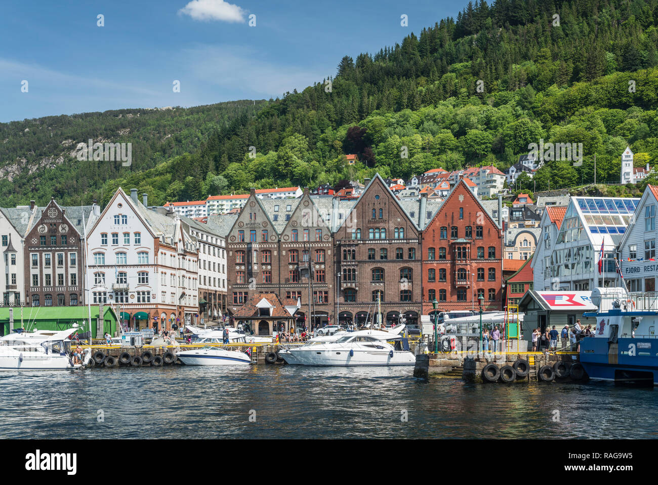 The wharf houses of Bryggen, are a series of Hanseatic commercial buildings lining the eastern side of the Vågen harbour in Bergen, Norway, Europe. Stock Photo