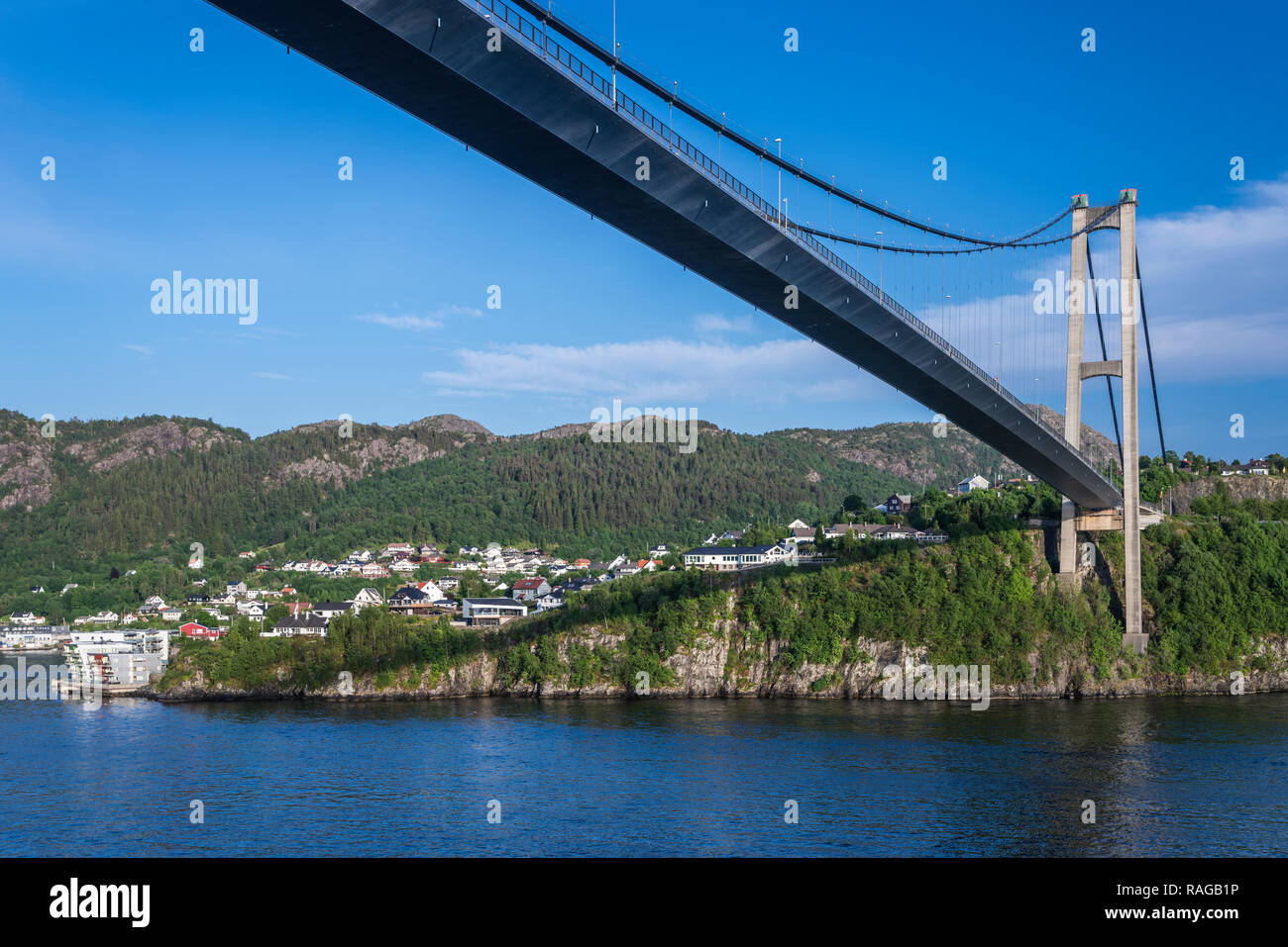 The suburbs and Askoy suspension bridge near Bergen, Norway, Europe ...