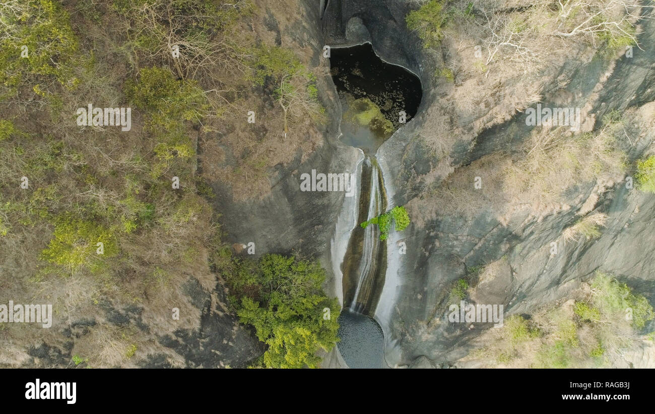 Aerial view of waterfall in the mountains of Filipino cordillera