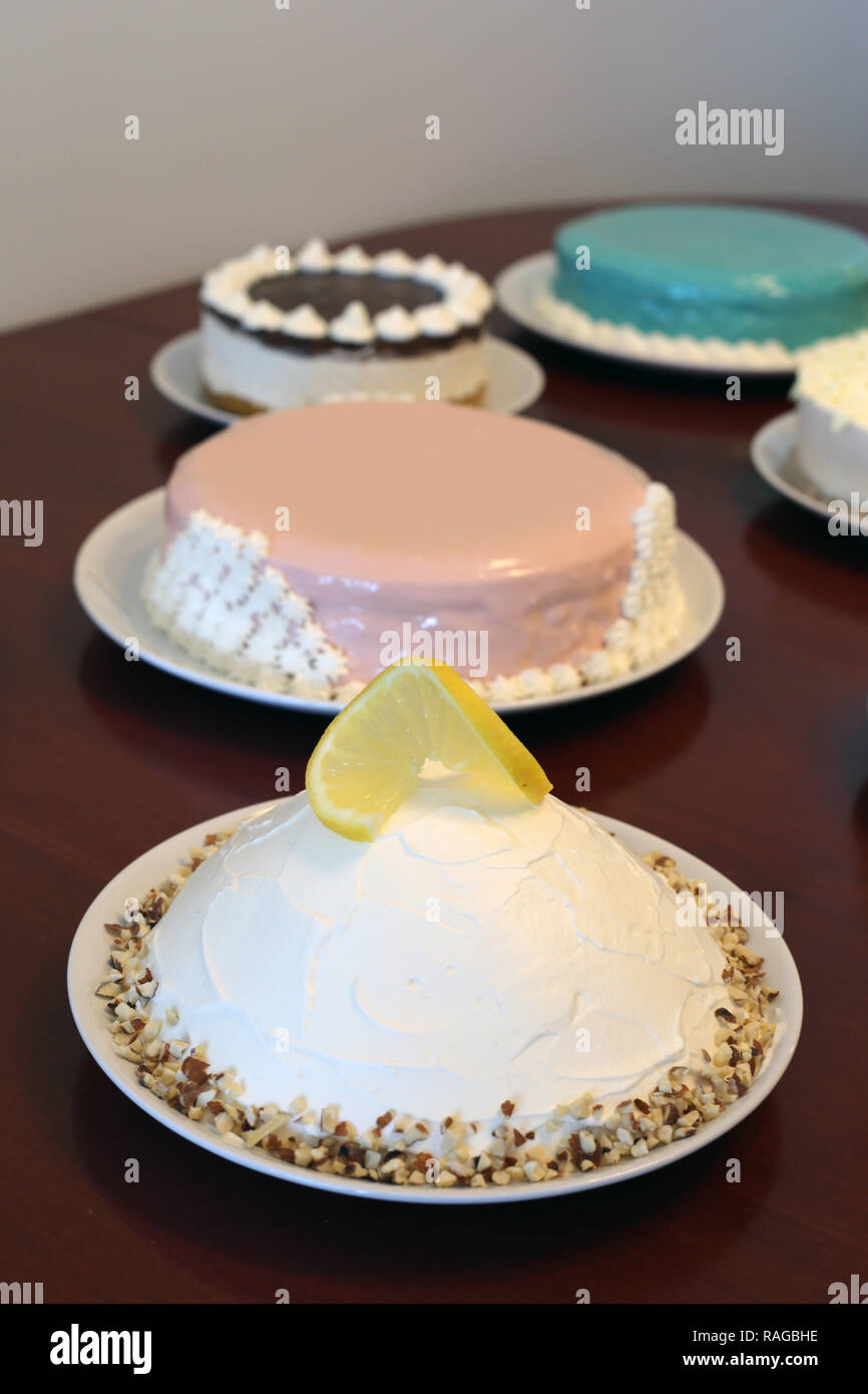 Plenty of homemade cakes with different icings, glazes and decorations