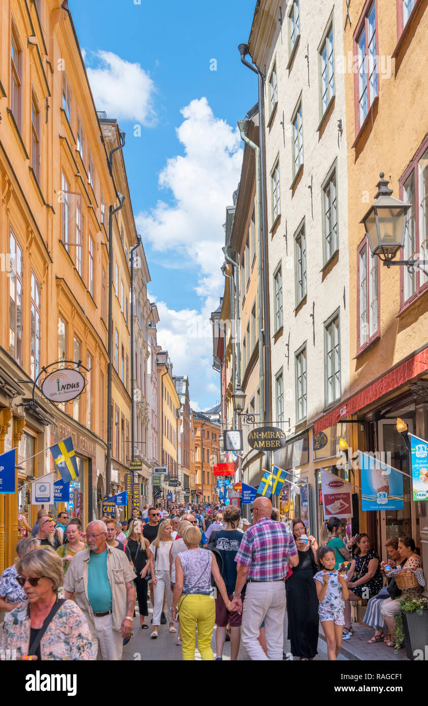 Tourists on Västerlånggatan, a main street in Gamla Stan (Old Town), Stadsholmen island, Stockholm, Sweden Stock Photo