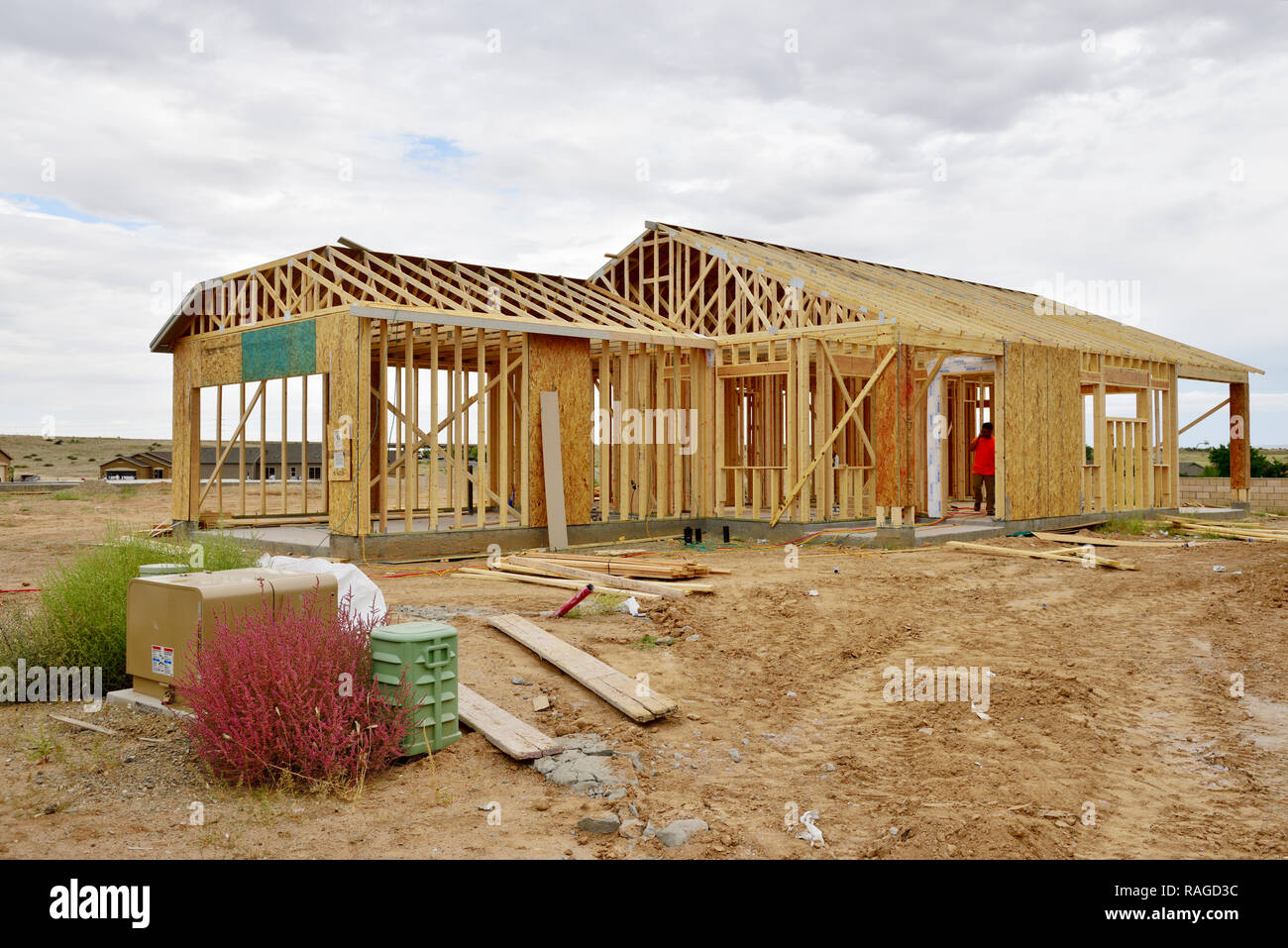 New wood frame house construction in USA, development of residential suburban site Stock Photo