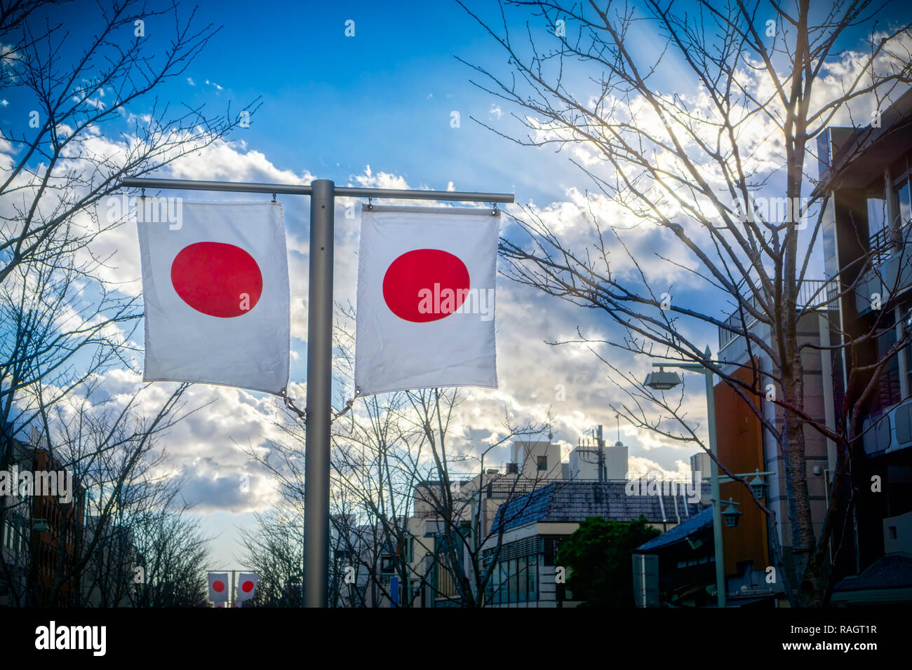 Japanese flags waving in the wind in the city of Kamakura, Japan. Stock Photo