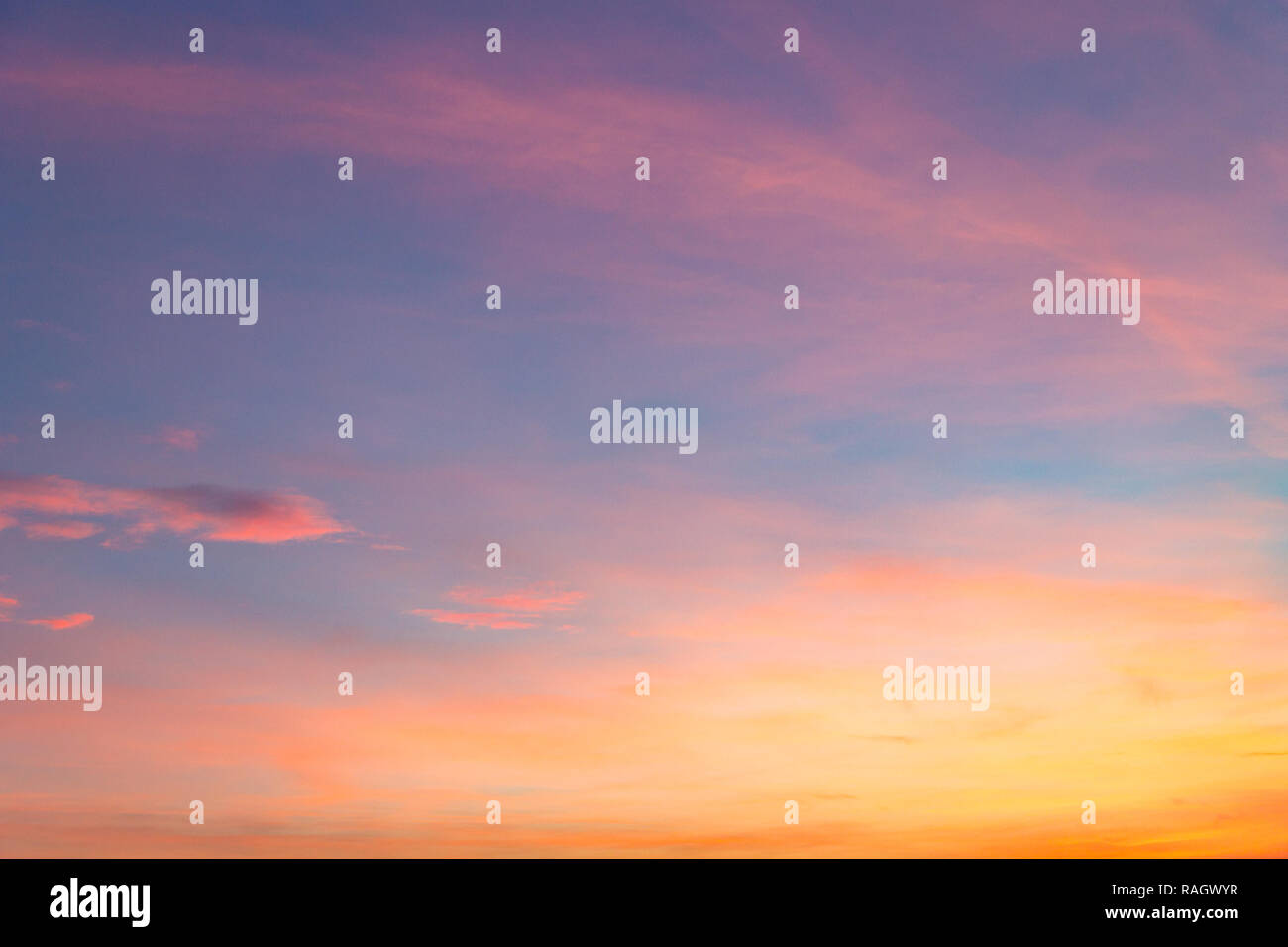 the sky at sunset with purple orange and blue hues. traces of ai Stock Photo