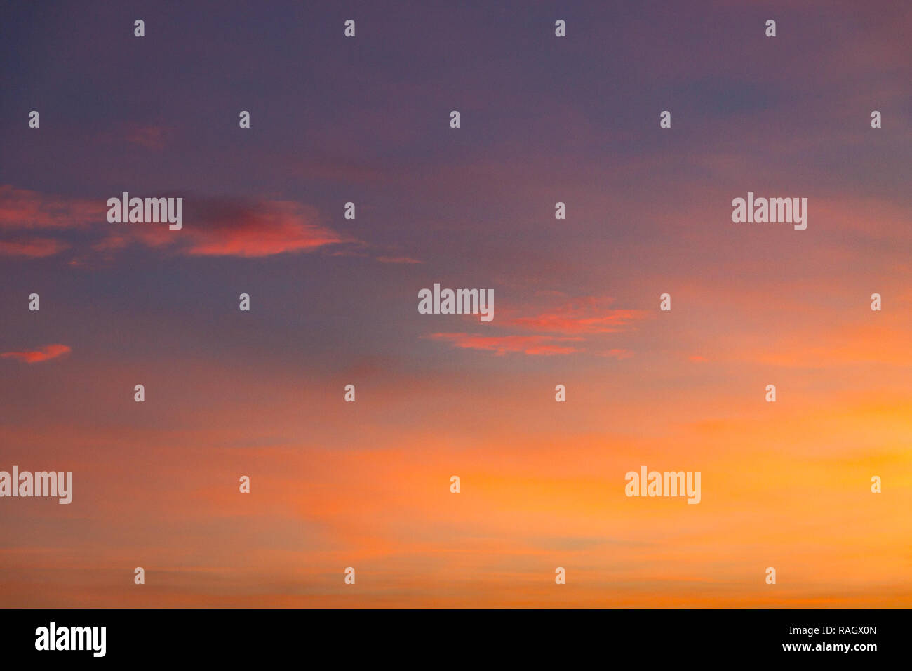 the sky at sunset with purple orange and blue hues. traces of ai Stock Photo