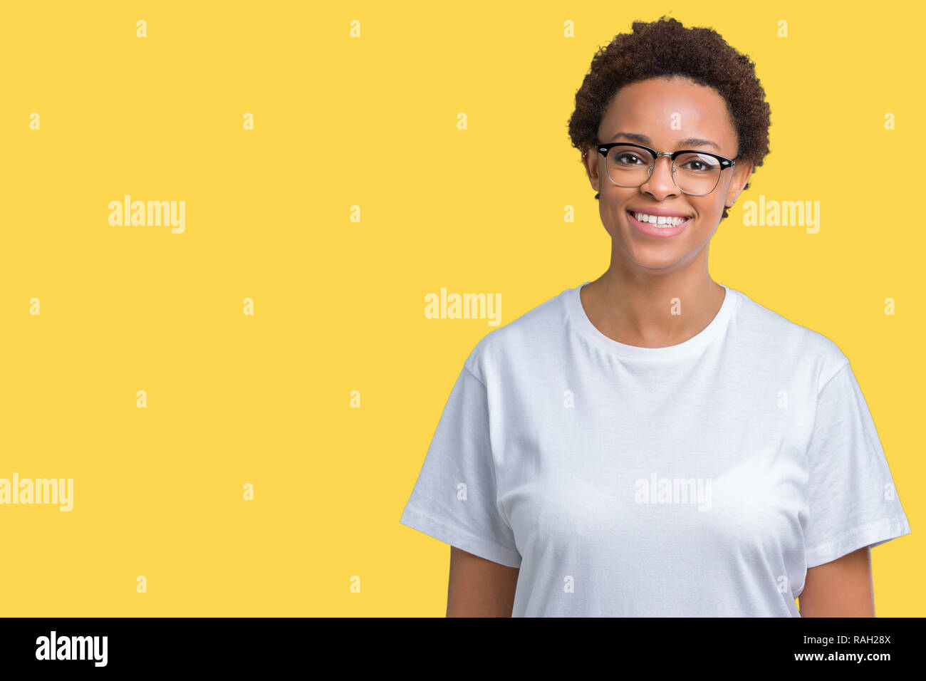 Beautiful young african american woman wearing glasses over isolated ...