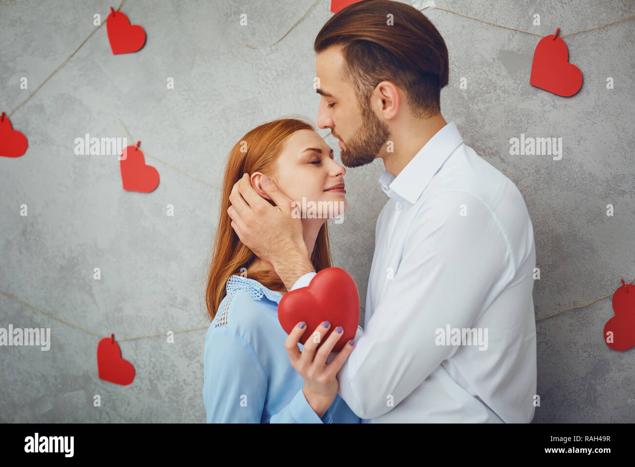 A loving couple with hearts .  Stock Photo