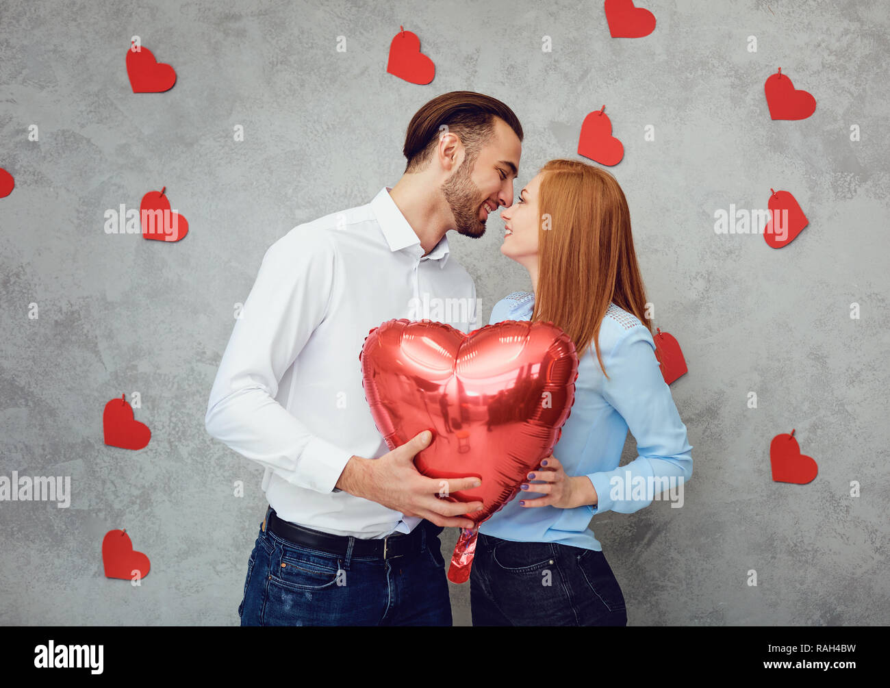 Cute couple with heart balloon Stock Photo