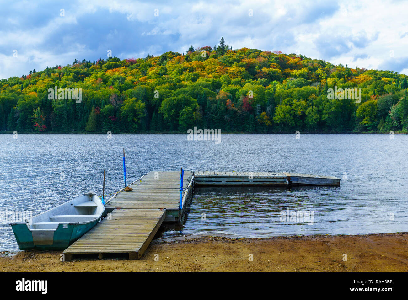 Boat and pier in Petit Lac Monroe, Mont Tremblant NP, Quebec, Canada