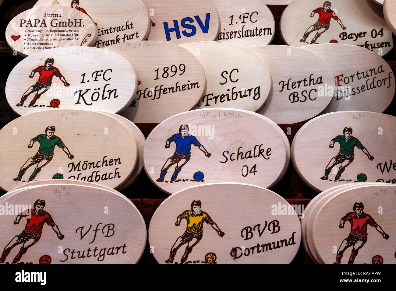 Wooden boards with various football Bundesliga clubs, Christmas market, Stuttgart, Baden-Württemberg, Germany Stock Photo