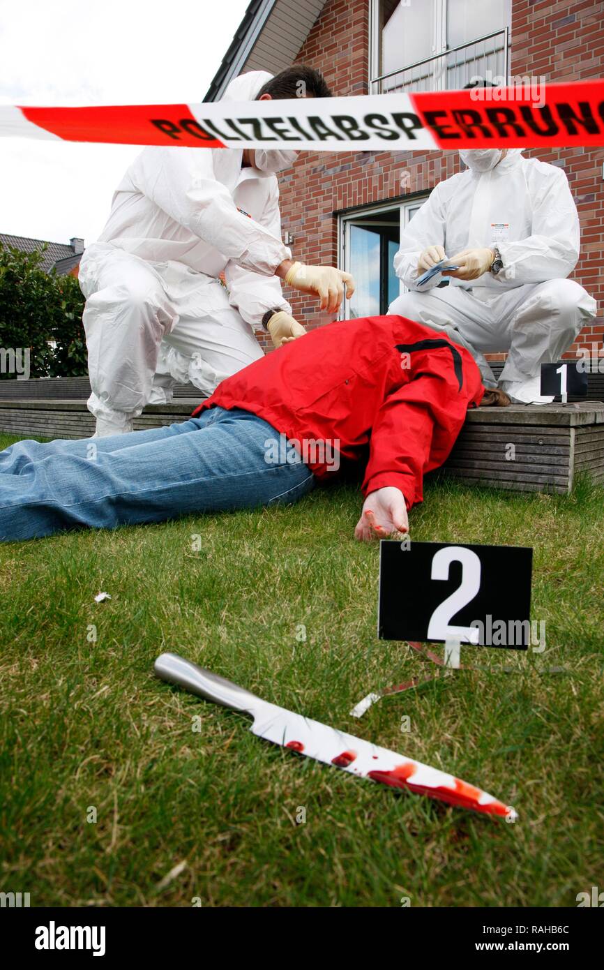 Securing of evidence at a crime scene after a capital offence, murder, homicide, crime scene department of the police Stock Photo