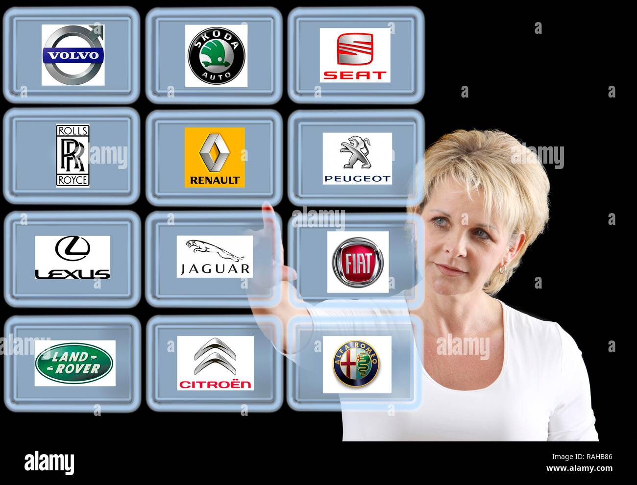 Woman working with a virtual screen, touch screen, European car brands Stock Photo