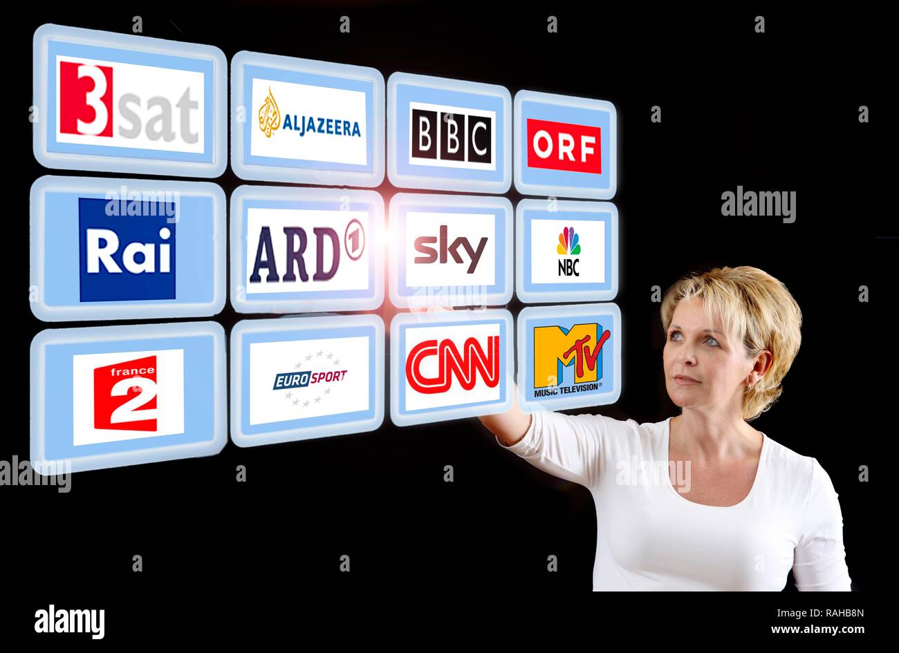Woman working with a virtual screen, touch screens, European television stations Stock Photo