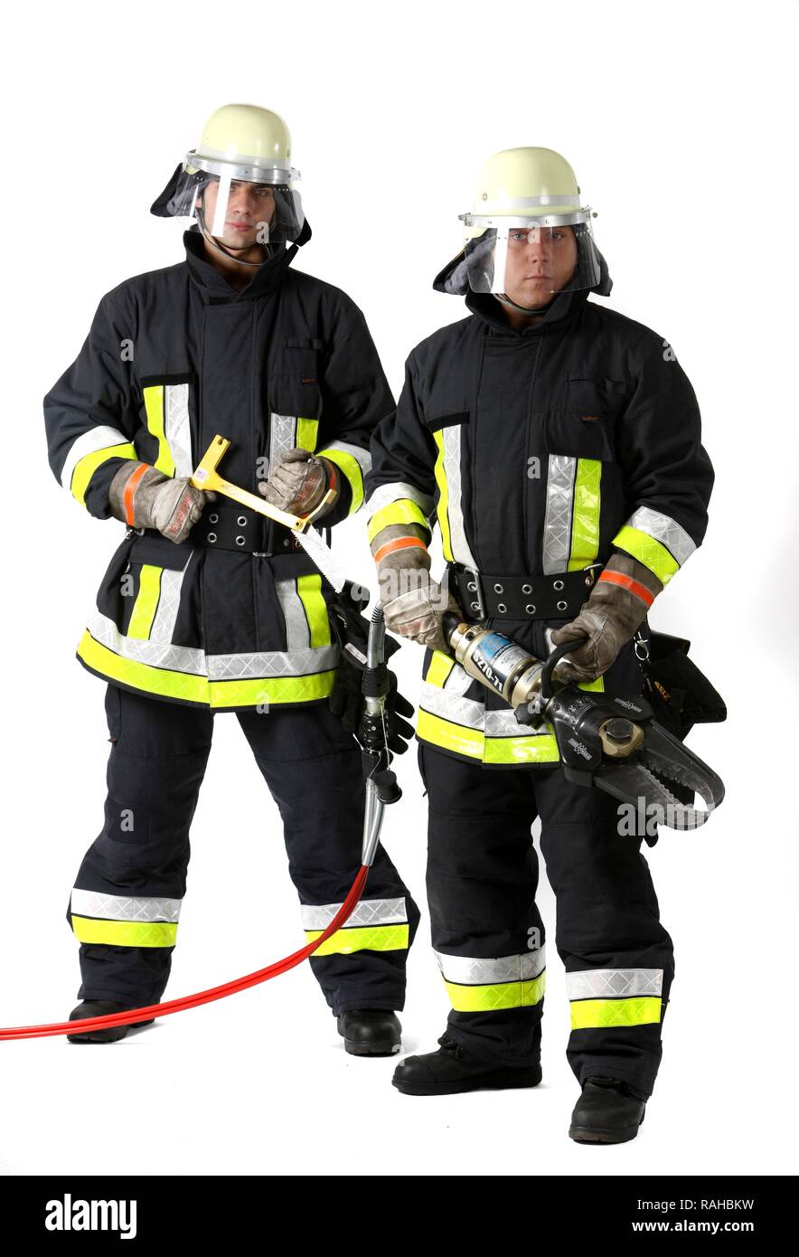 Firefighters holding a glass saw and hydraulic shears used to cut metal