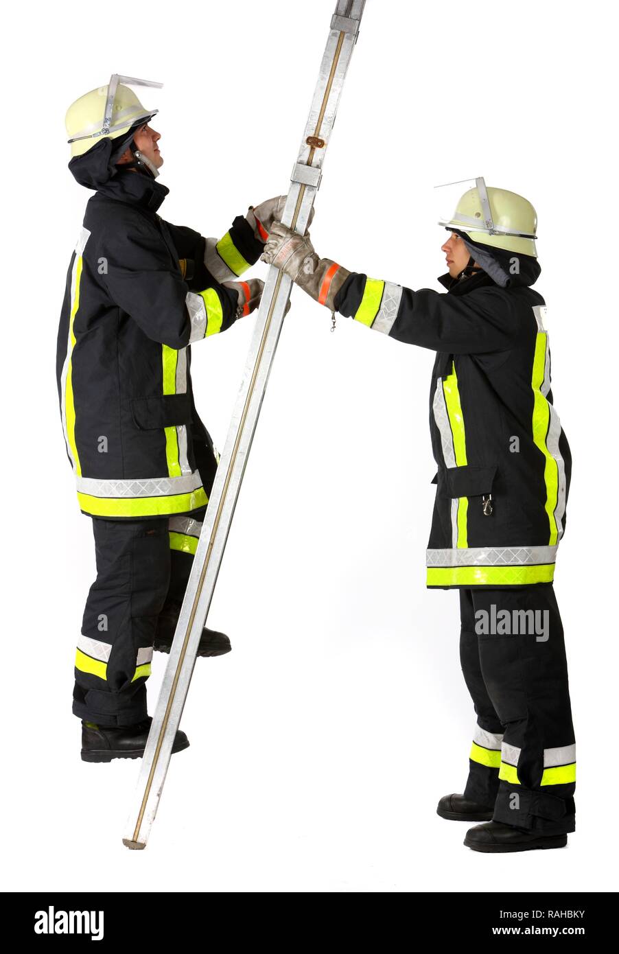 Firefighters with an aluminum ladder, professional firefighters from the Berufsfeuerwehr Essen, Essen, North Rhine-Westphalia Stock Photo