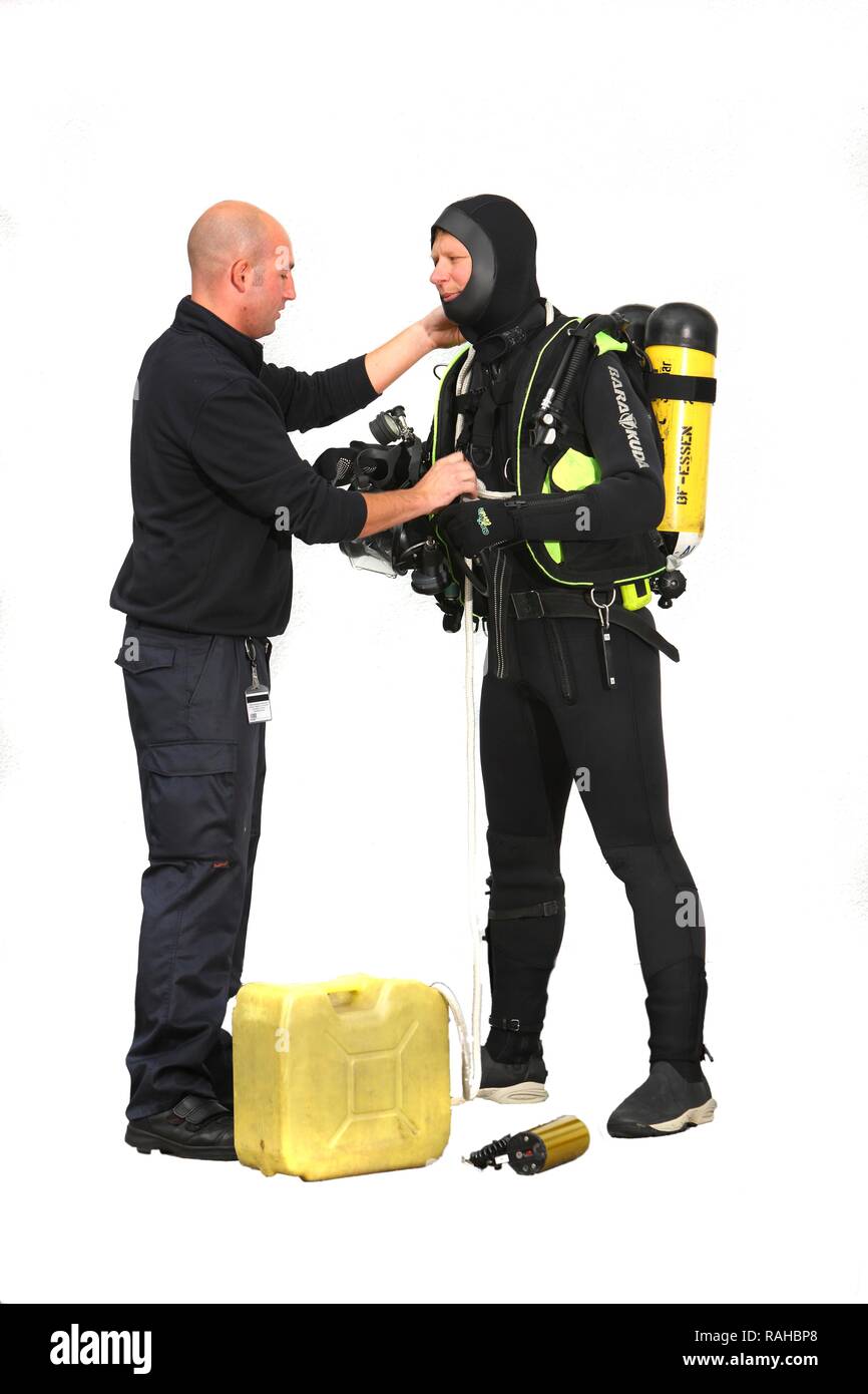 Rescue and salvage diver from the fire brigade, with a security man, lead man, professional firefighters from the Stock Photo