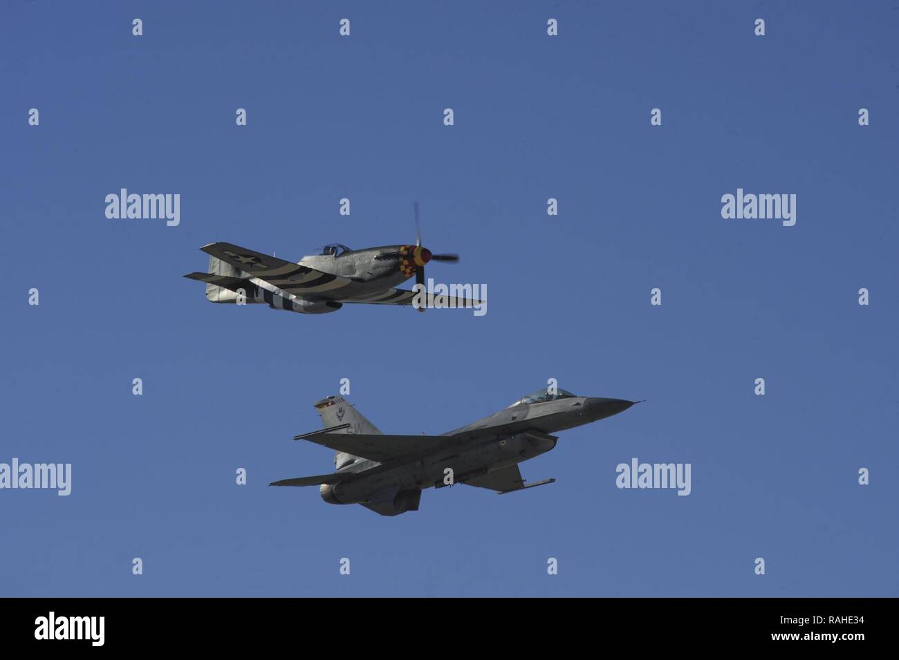 A P 51 Mustang And A U S Air Force F 16 Fighting Falcon Preform A Fly