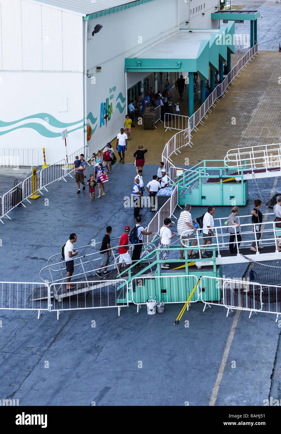 Many Cruise Ship Passengers Boarding in Aruba Stock Photo - Alamy