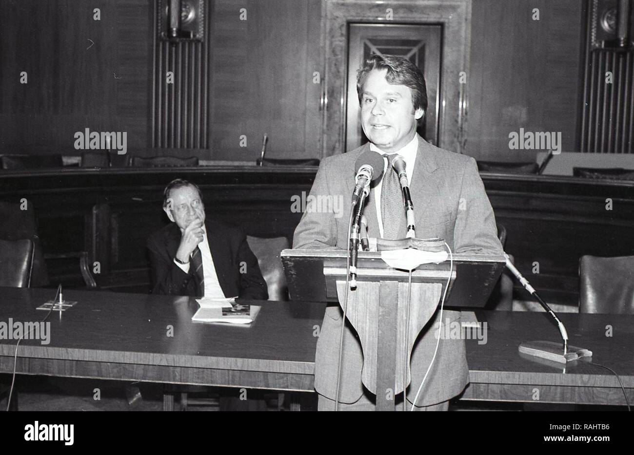 MAN AT THE PODIUM GIVING A SPEECH Stock Photo - Alamy