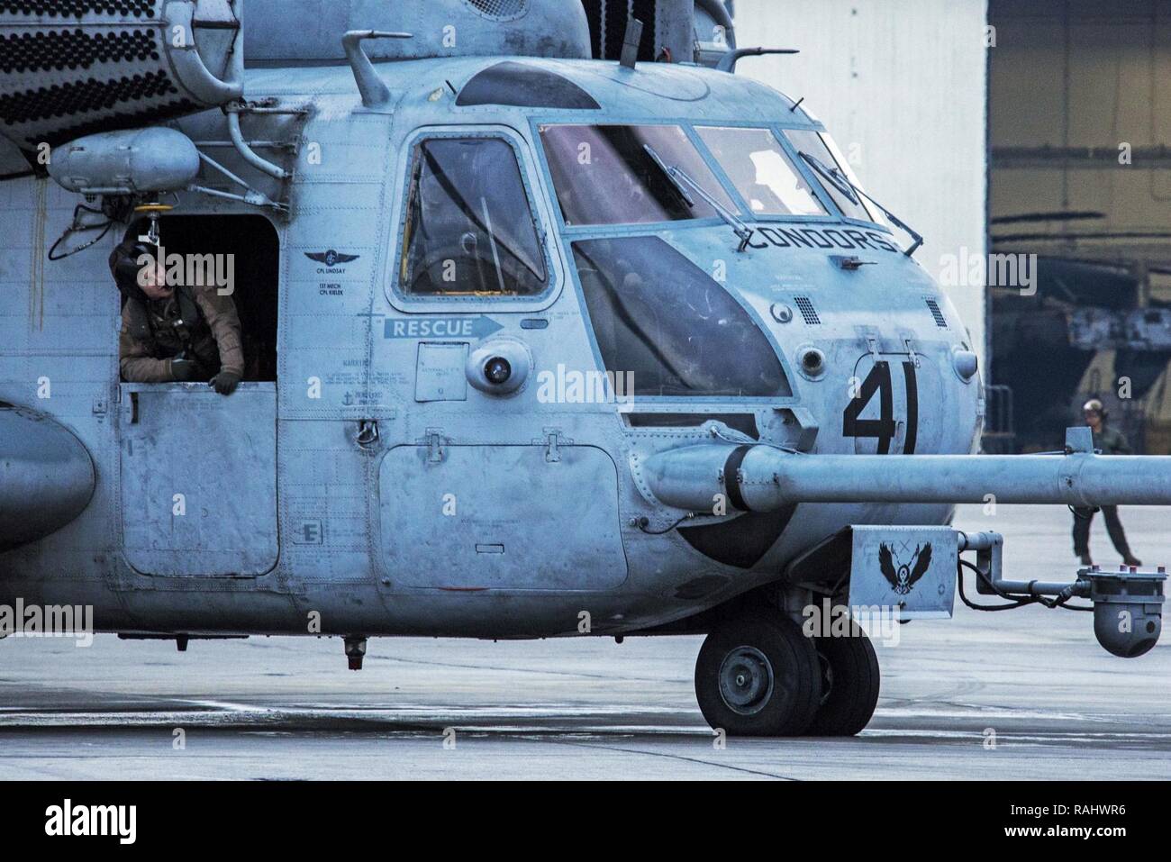 U.S. Marines with Marine Heavy Helicopter Squadron 464 prepare for a “Max Launch”, Marine Corps Air Station New River, N.C., Feb. 3, 2017. The purpose for this flight is to celebrate a rarely achieved maintenance goal of having all aircraft operational at one time. Stock Photo