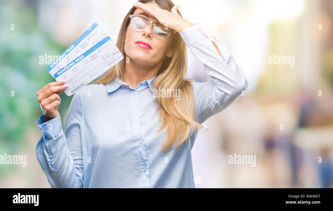 Stressed Out Students How Boarding >> Young Beautiful Woman Holding Boarding Pass Over Isolated Background Stressed Out Students How Boarding >> Young Beautiful Woman Holding Boarding Pass Over Isolated Background