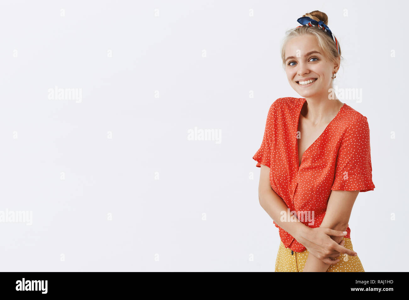 Woman asking boyfriend for white dance. Studio shot of charming emotive ...