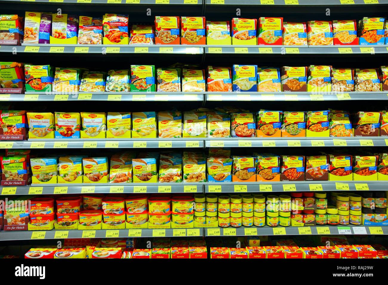 Shelves with packet soups, convenience foods, condiments, self-service, food department, supermarket Stock Photo