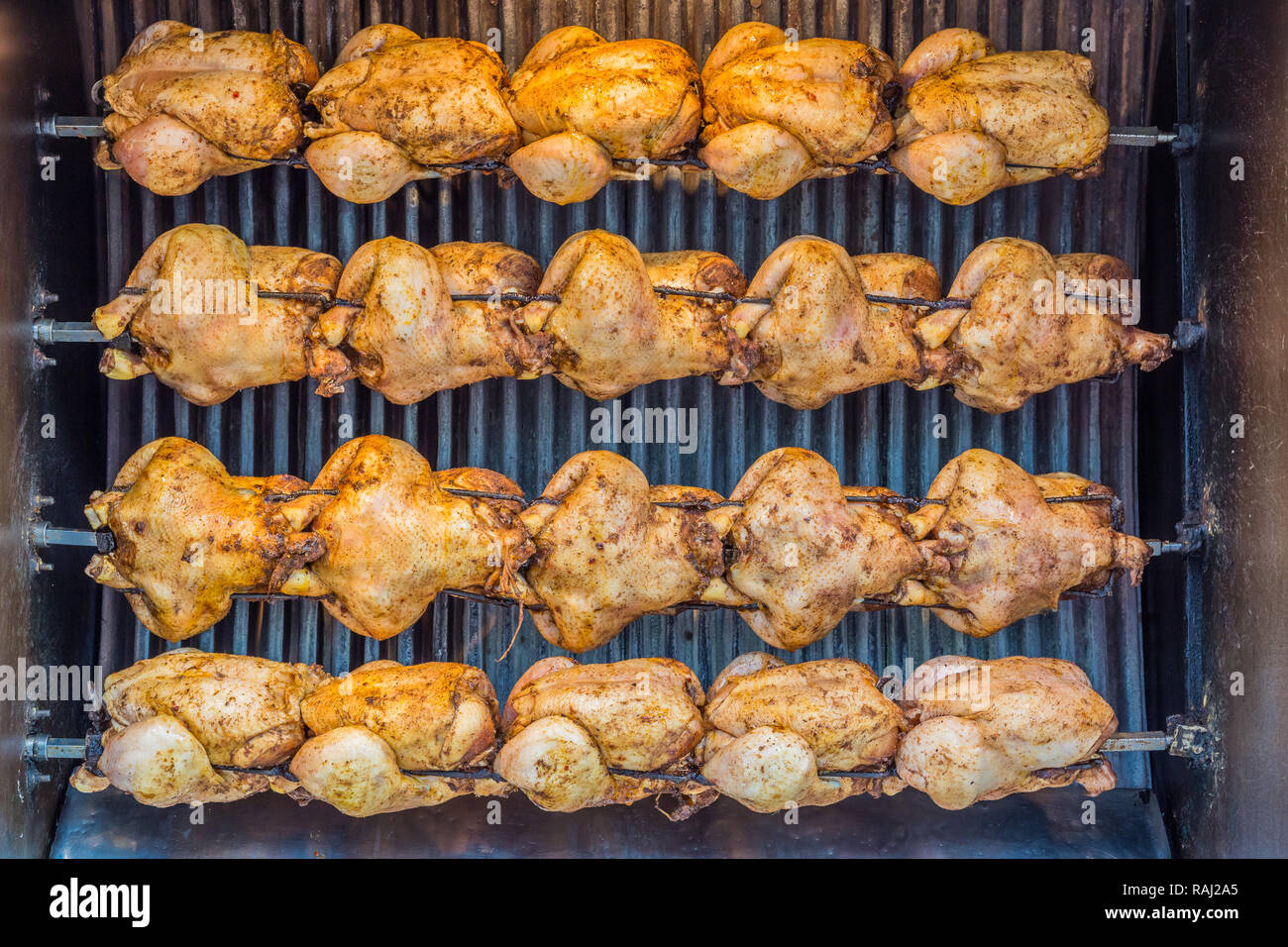 Chickens roasting in a rotissarie machine, in Istanbul, Turkey. Stock Photo