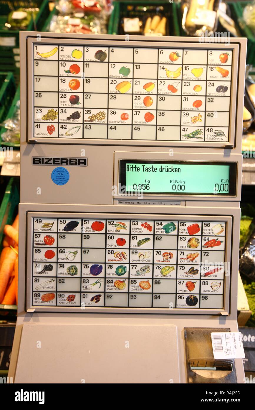 Price computing scales in the fruit and vegetable section of a self-service grocery department, supermarket Stock Photo