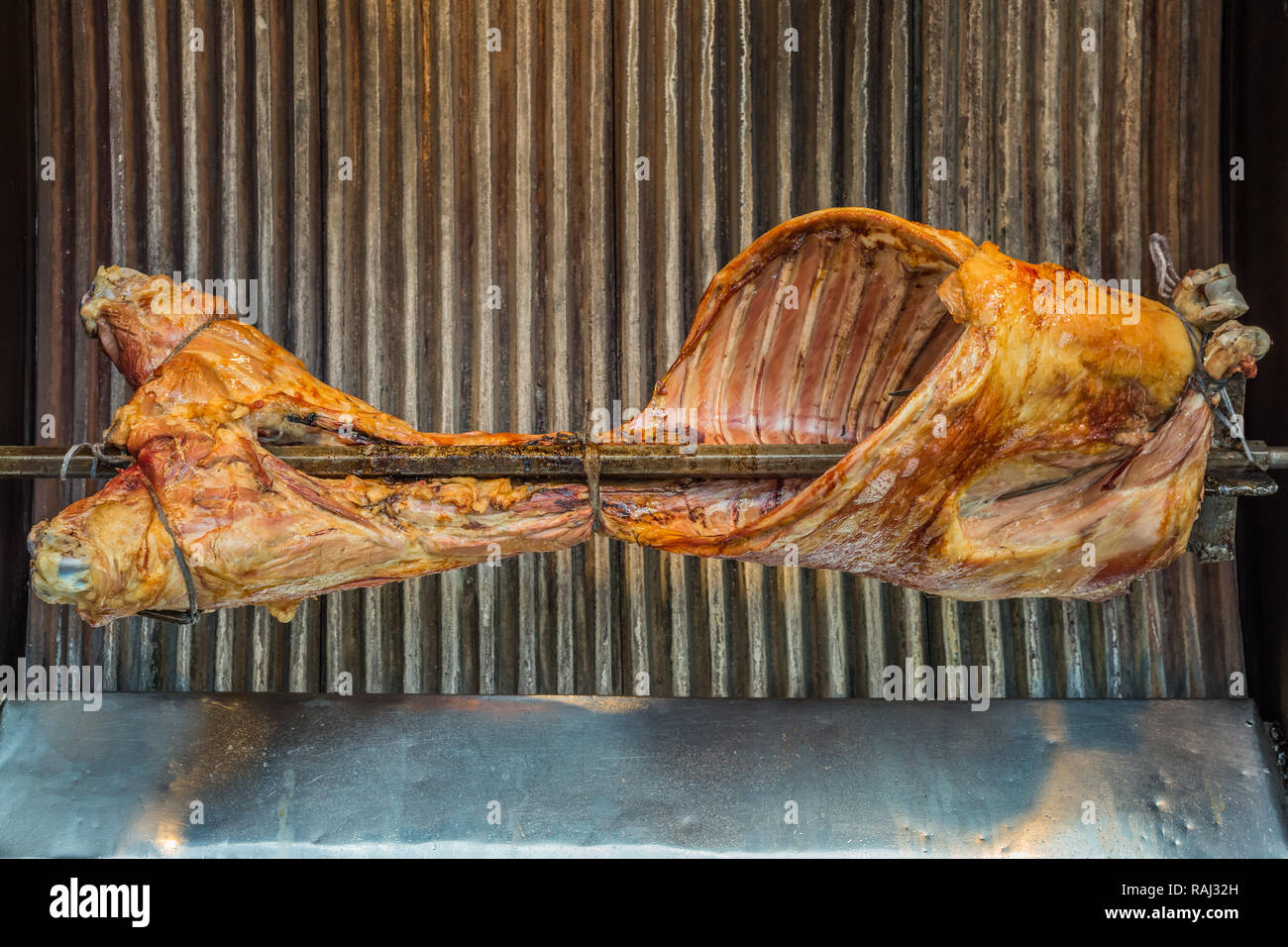 Lamb roasting in a rotissarie machine, in a restaurant in Istanbul, Turkey. Stock Photo
