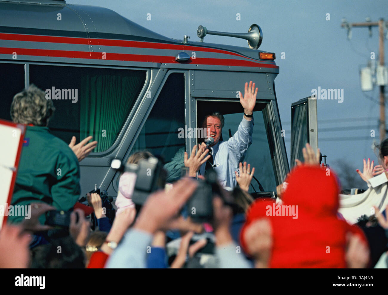 Charlottesville, Virginia 1993/01/17.  President elect Bill Clinton waves as he boards a bus from  Charlottesville, Virginia to Washington, DC for his Inauguration. Photo by Dennis Brack Stock Photo